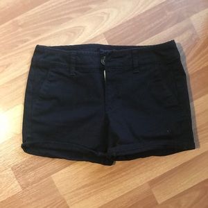 American Eagle slick black material